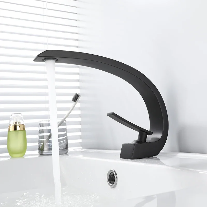 

black faucet waterfall sink bathroom