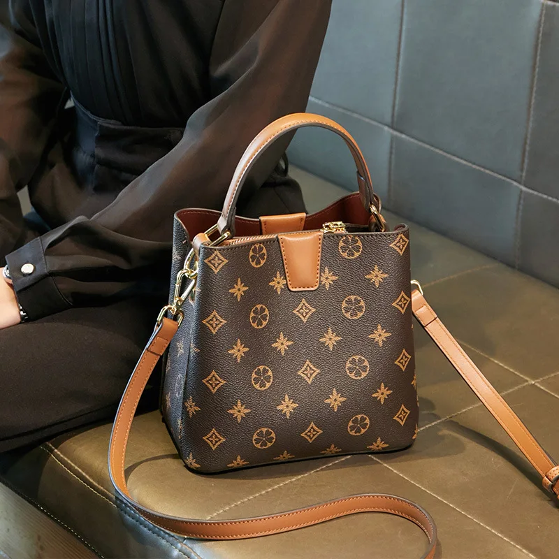 

Женская сумка-ведро, новинка 2026 года, корейская версия, сумка через плечо, популярная модель этого года.