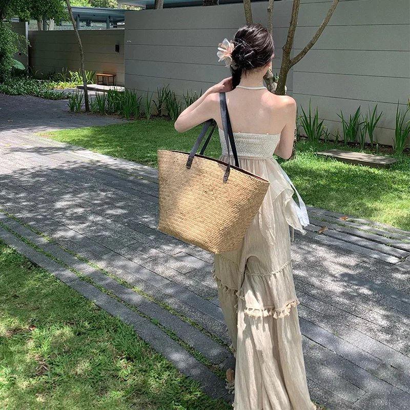 Completo estivo da donna in cotone e lino con top a fascia, pantaloni a gamba larga con nappe e gonna a vita alta in poliestere...