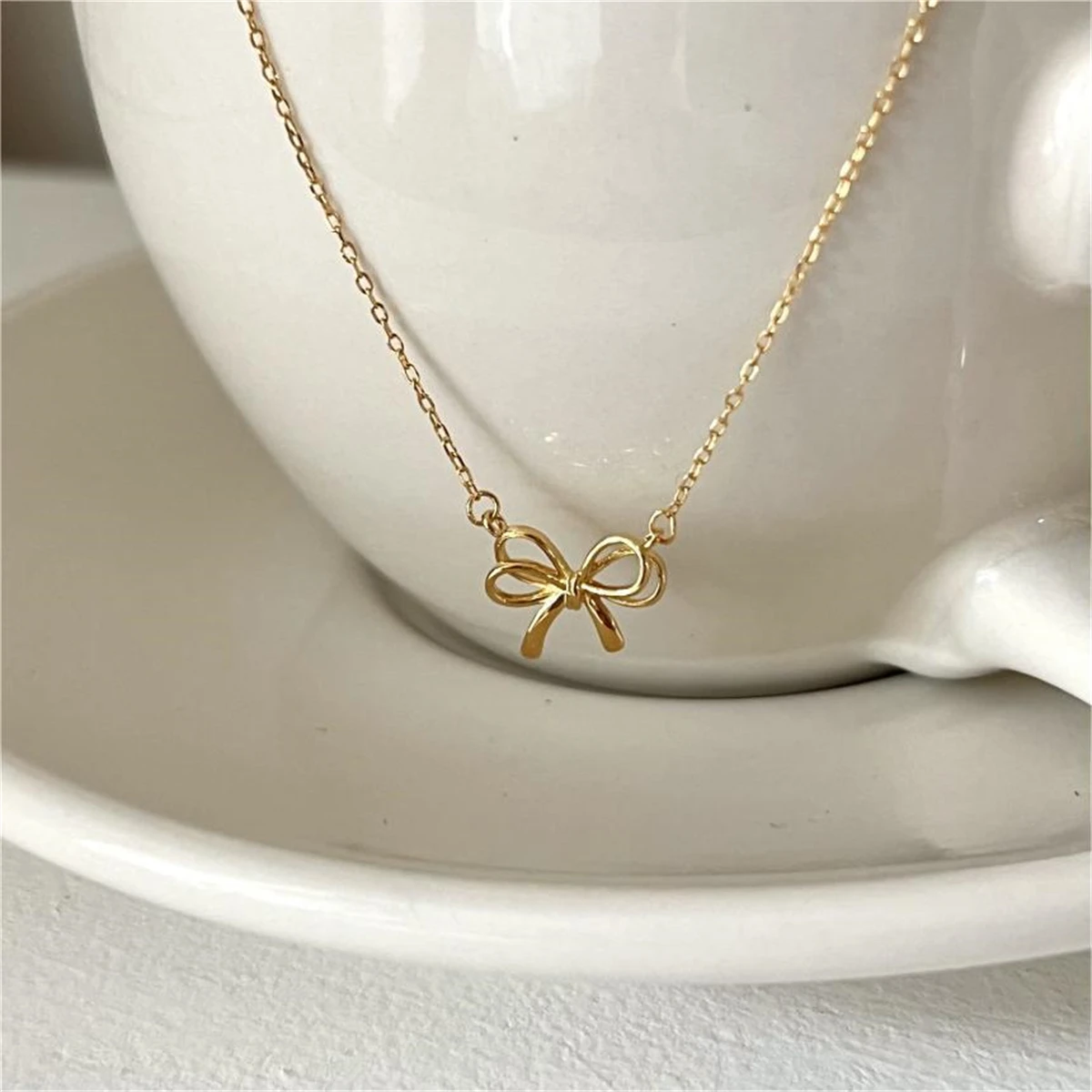 New Spanish overseas niche basic O-shaped chain bow fresh and sweet women\'s necklace copper plated gold