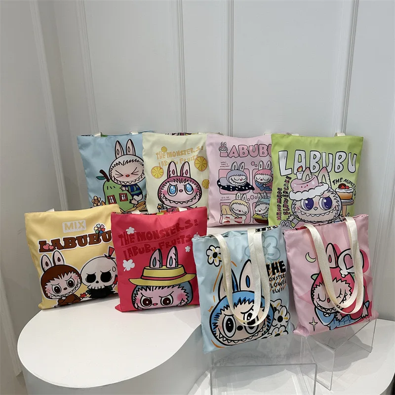 

New Labubu Canvas Bag Female Student Cute Cartoon Shopping Handbag Casual Shoulder Bag The Monsters Outdoor Travel Storage Bag
