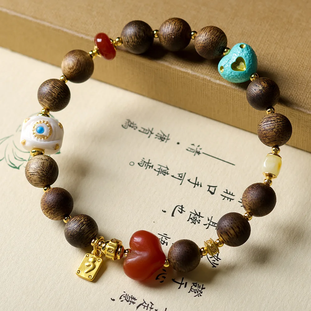 

Green Agarwood and South Red Agate Peach-Shaped Bead Bracelet Antique Amber and Turquoise Root-Style Bead Bracelet for Women
