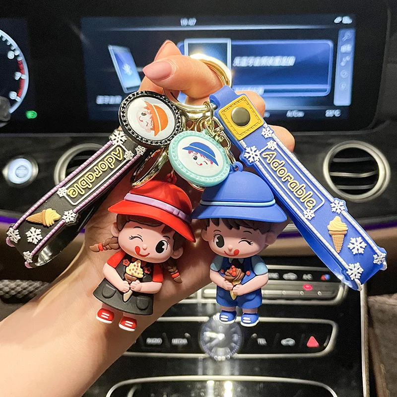 

miniso Creative 3D figurines of girl keychain pendants, couple schoolbags and key chains