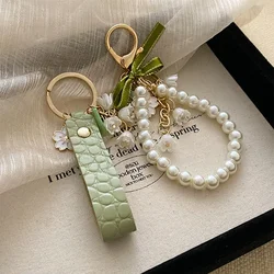 Fresh And Elegant Bell Orchid Keychain Women Green Sweet Imitation Pearl Leatherresin Alloy Keychain Jewelry Accessory Gifts K-