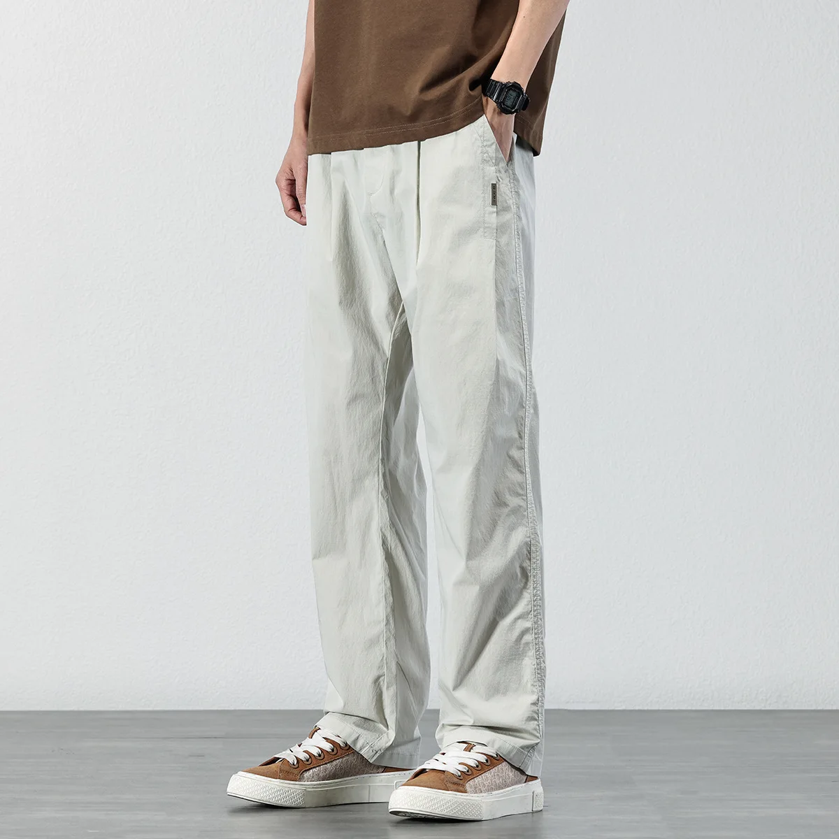 Rechte casual herenbroek lente en herfst eenvoudige effen kleur losse broek elastische veelzijdige broek met wijde pijpen trendy