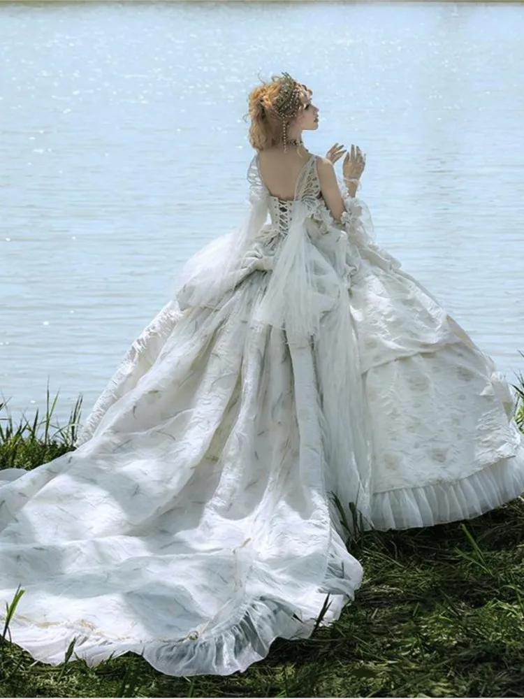 

Elegant wedding dress with lace beading and sequin embroidery