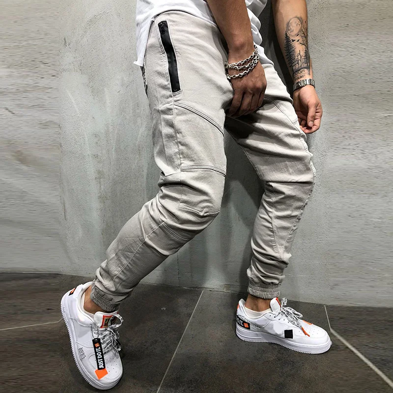 Pantaloni da uomo autunnali Hip Hop pannello con cerniera laterale tinta unita semplice moda sport pantaloni da lavoro Casual da uomo pantaloni Cargo da uomo