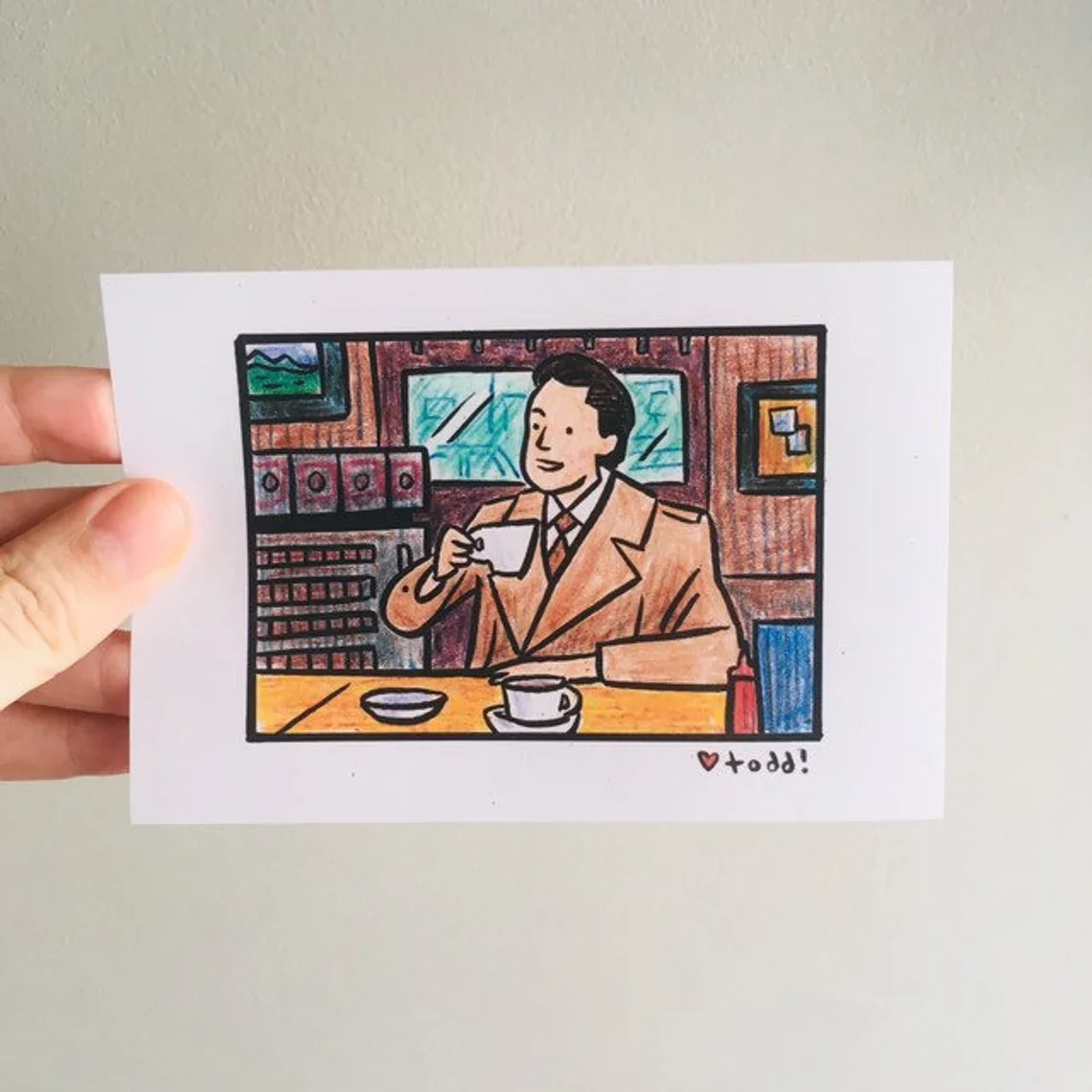 “Vintage-Style Hand-Drawn Illustration Art Print - Charming Man Enjoying Coffee in a Cozy Café Scene | Whimsical Retro Wall Deco view 4