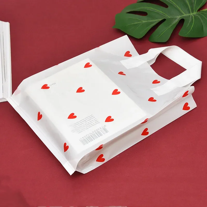 

50pcs Plastic Packaging Bag With Handle Little Red Heart Gift Jewellery Pouches Wedding Favor Decor Bags