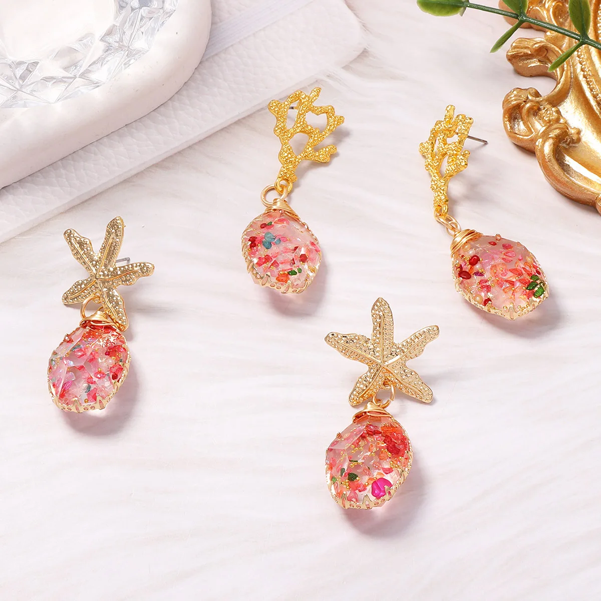Niche ocean style design feeling island floral powder crystal starfish earrings, beach outing atmosphere feeling women's earring