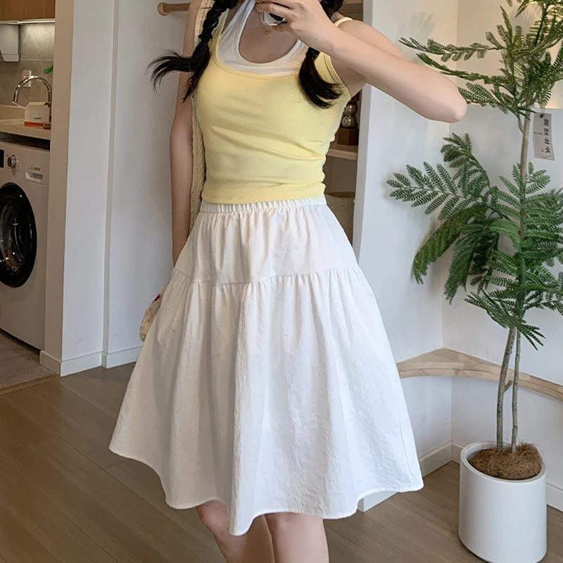 

College Style Loose A Line Skirts Women Summer Elastic High Waist Pleated Skirts Woman Japanese Solid Above-Knee Length Skirt