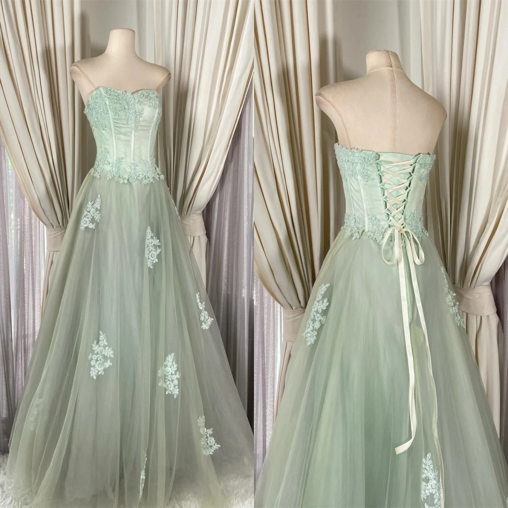

Customized Elegant Graceful Green Tulle Evening Dress High Quality Strapless Sleeveless Lace Up Back Appliques Homecoming Dress