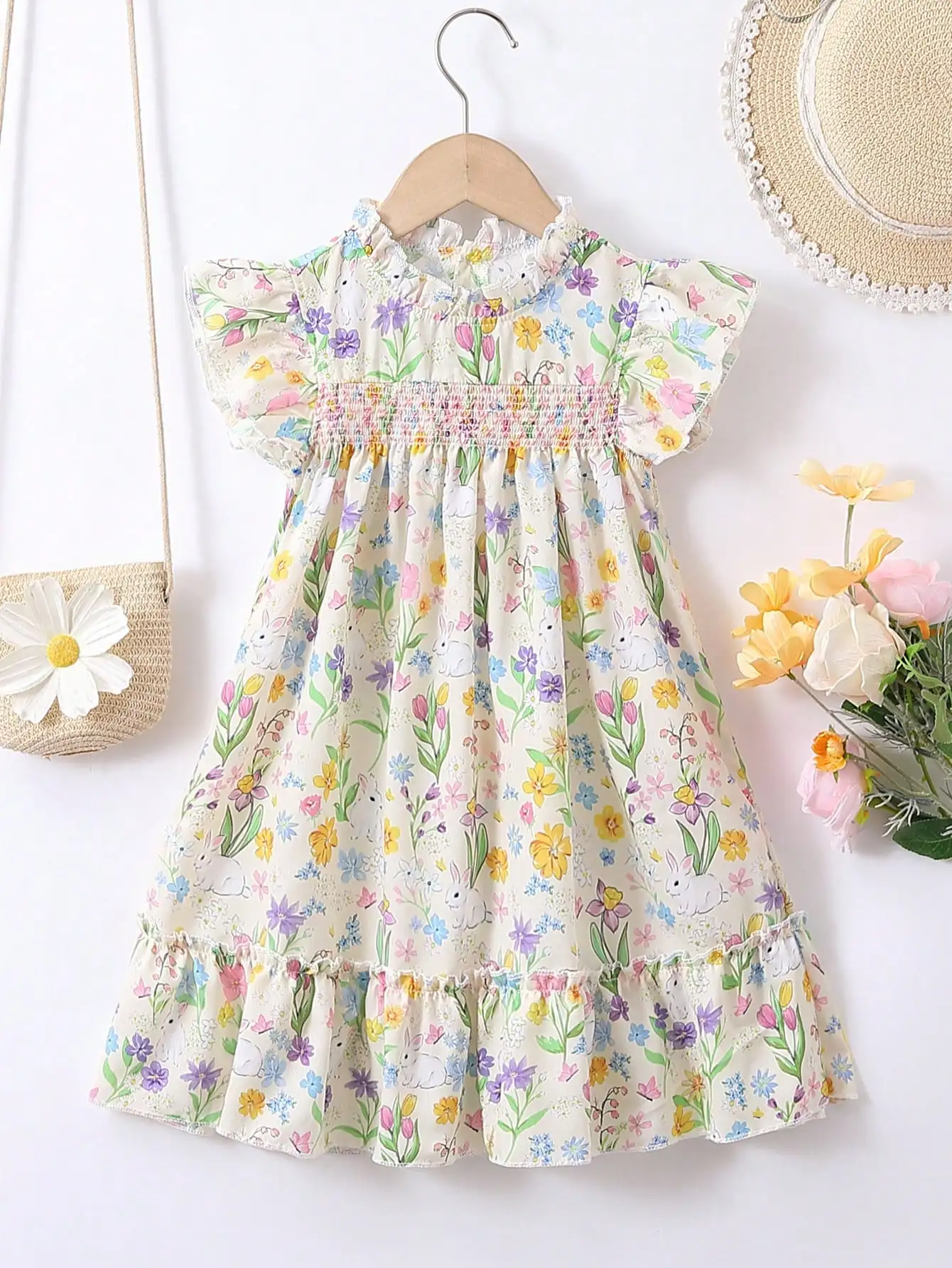 

Girls Floral Bunny Print Smocked Dress with Ruffled Sleeves and Hem
