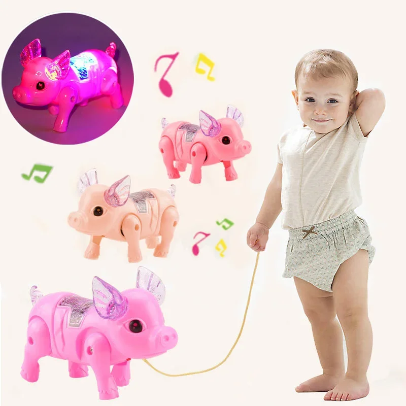 Simpatica musica elettrica a LED per maiale che cammina, corda elettronica che tira animali domestici con musica da passeggio leggera, animali domestici elettronici per bambini, neonati