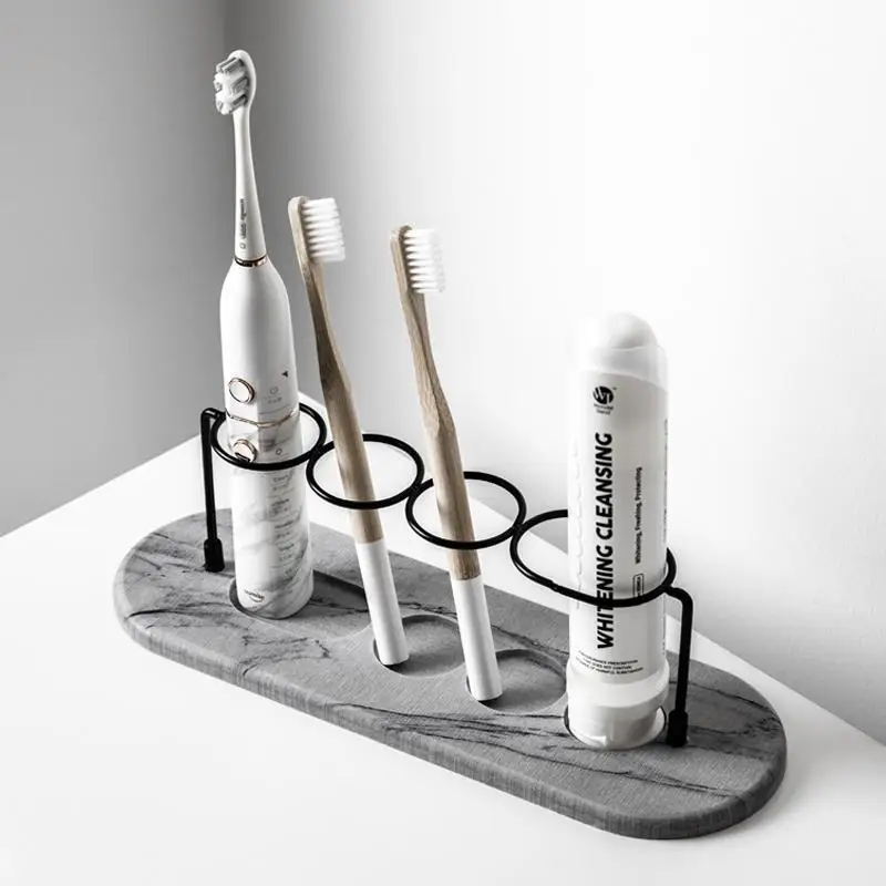 

Fashionable Electric toothbrush rack base bathroom countertop storage rack diatom mud absorbent pad metal toothbrush holder