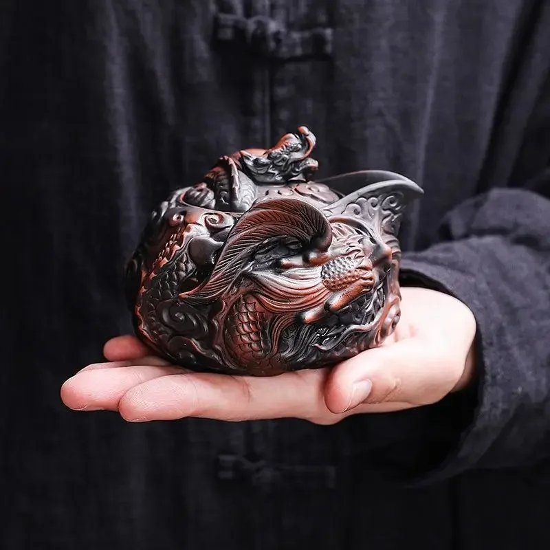 Chinese purple pottery handmade pile carving flying dragon hand grab pot Tea Travel Set a Pot Two Cups Kung Fu Tea Set