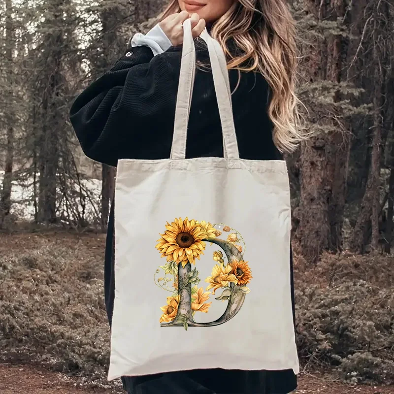 Sunflower letter printed canvas bag, women\'s shoulder bag, handbag, large capacity storage bag, foldable and reusable