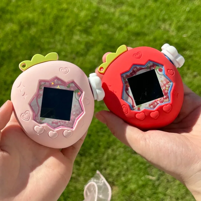 لعبة Tamagotchi Uni Electronic Pet مع غطاء حماية من السيليكون باللون الأحمر/الأخضر والتفاح/الفراولة