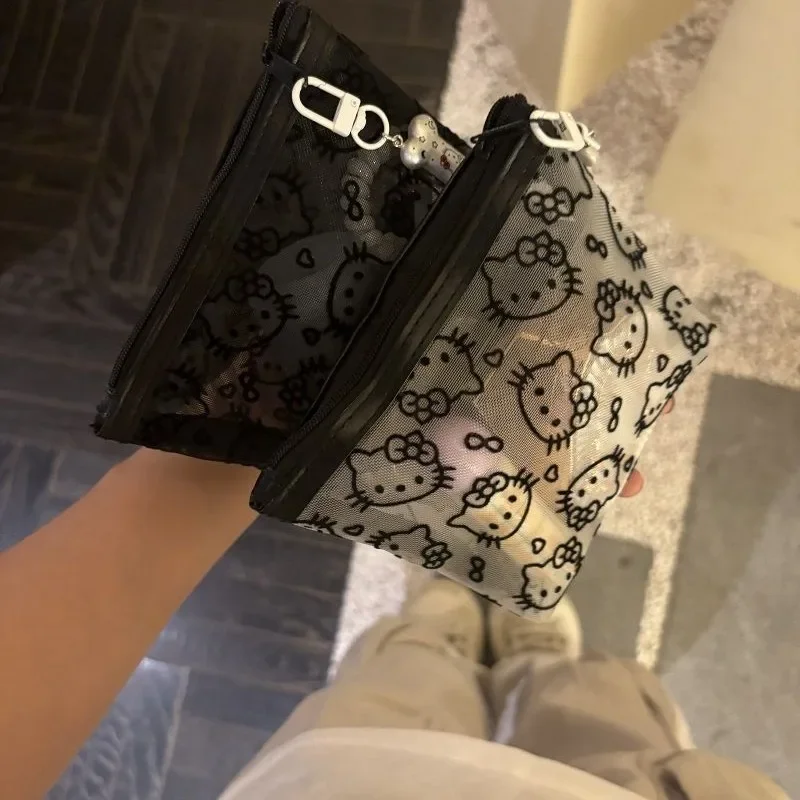 2026 New Sanrio Hello Kitty Mesh Material Storage Bag Portable Zipper Coin Purse Creative Earphone Bag Cute Girls Cosmetic Bag view 3