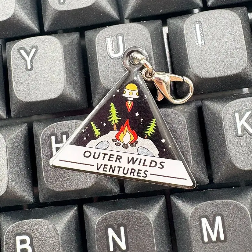 Juego de aventura Outer Wilds Ventures Logo periférico llavero nave espacial llama llavero insignia jugador regalo colgante Accesorios