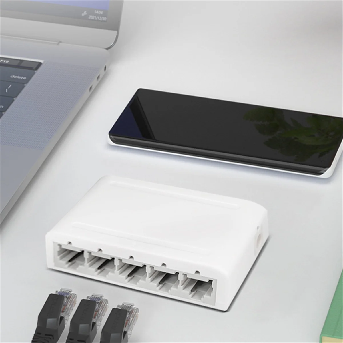 مقسم إيثرنت لسطح المكتب مع منافذ محمية ، ومفتاح بيانات ، ومحور شبكة ، ومقبس وتشغيل ، وبدون مروحة ، و 5 منافذ