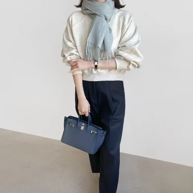 เสื้อสเวตเชิ้ตแขนยาวสีพื้นเรียบง่าย สไตล์ลำลอง ใส่ได้หลายโอกาส ทรงหลวม ใส่เป็นเสื้อตัวในได้ เหมาะสำหรับฤดูใบไม้ผลิและฤดูใบไม้ร่วง