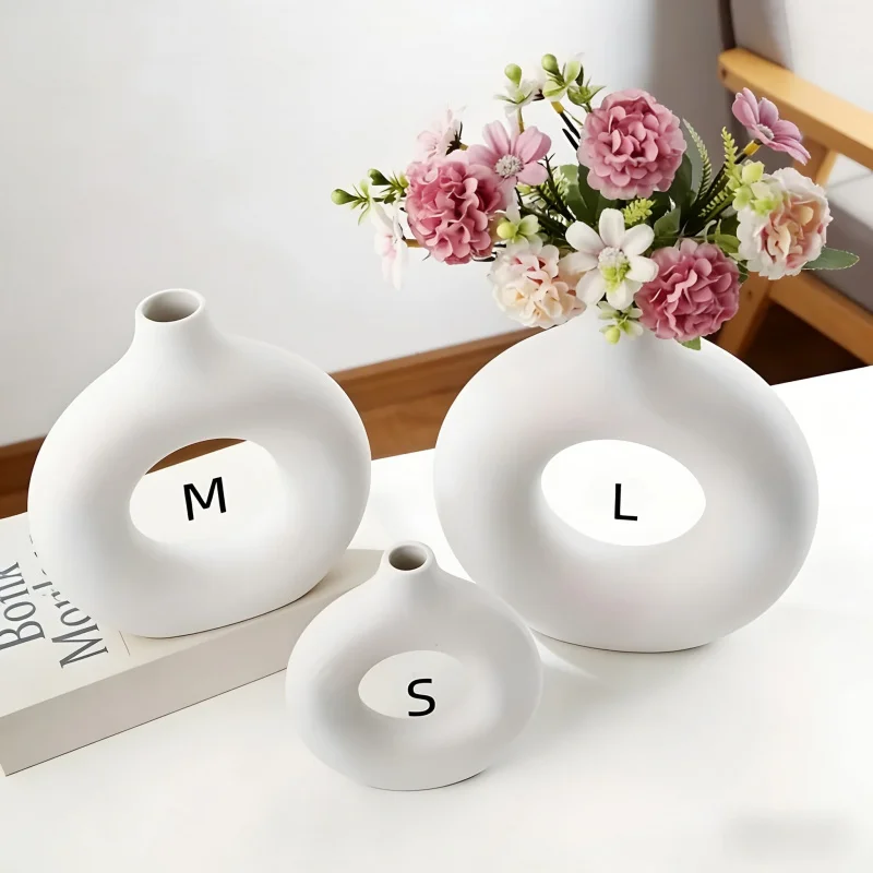 Moderne Minimalistische Donut-Plastikvase Wohnzimmer Schlafzimmer Schreibtisch-Dekoration Ornament Blumenarrangement-Behälter Nordischer Stil