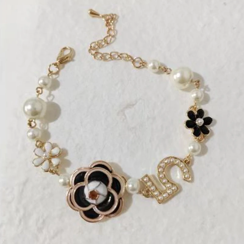

1 Pcs Luxury Handmade Crystal Camellia Flower Pearl Bead Bracelet Bangle Jewelry for Women