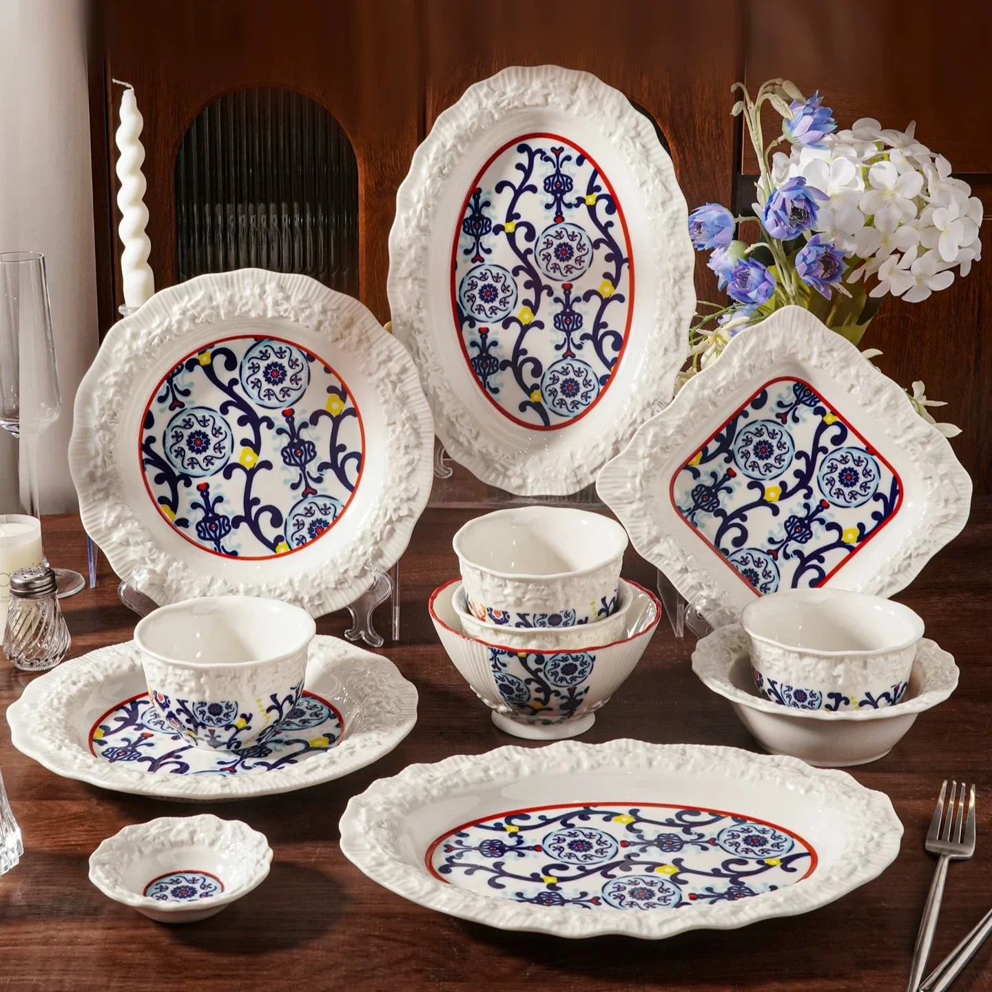 

Vintage delicate lace-shaped ceramic tableware, household dishes and plates set