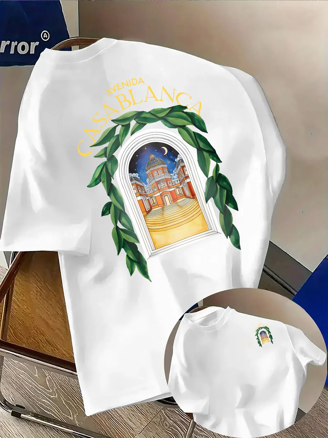 Fashionable North African Style Printed T-shirt Featuring A Green Leaf Pattern of The Night Cityscape High-quality Streetwear