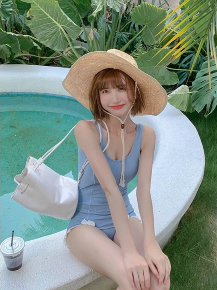 

Hot spring vacation style sweet girl blue bow one-piece swimsuit ins style spicy girl retro sexy swimsuit millennium style