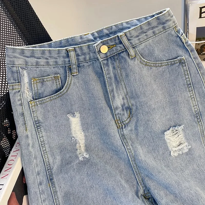 Pantaloni al ginocchio in Denim strappato con foro estate 2024 delle donne nuovi pantaloni da ciclismo con spacco dritto a vita alta coreani pantaloni centrali