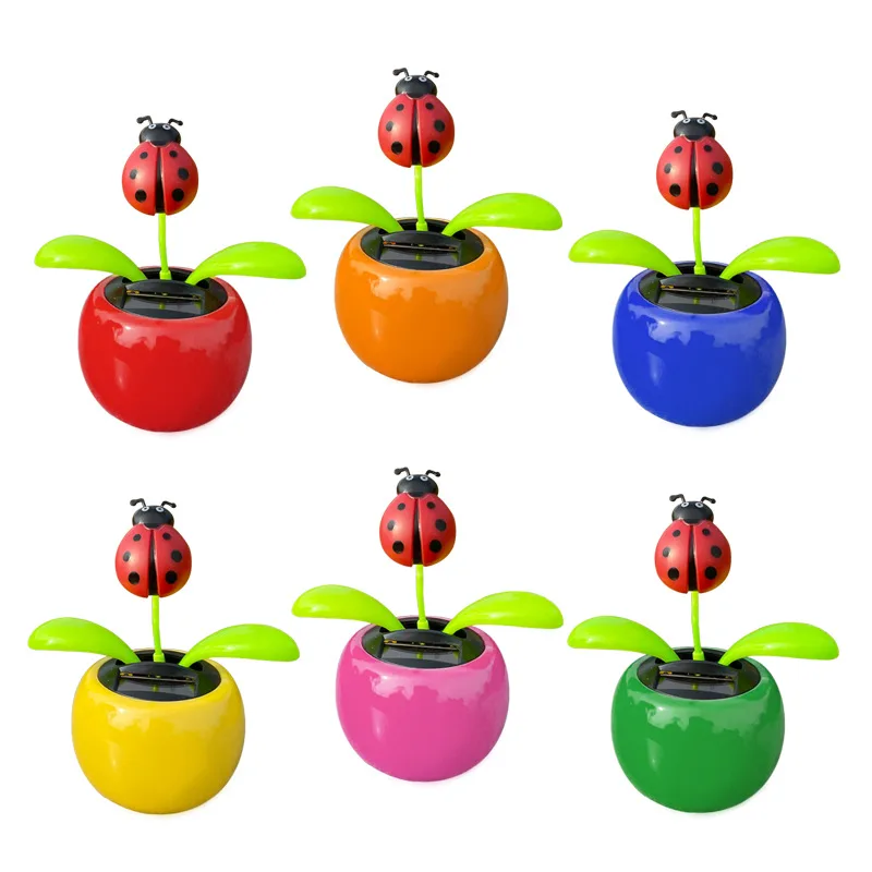 Cute Swinging Beetle Flower Doll giocattoli solari ornamento per auto creativo Cartoon Beetle decorazioni solari per Desktop giocattoli solari per bambini