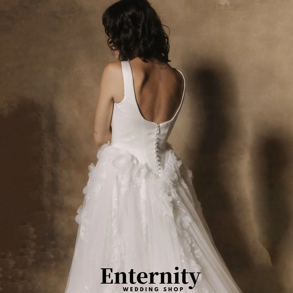 カスタマイズされたレースアップリケのウェディングドレスエレガントな V ネックスパゲッティストラップ女性のための魅力的なブライダルドレス Vestidos デノビア