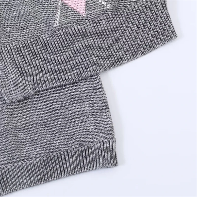 KEYANKETIAN 2026 New Women's American Retro Cropped 2-in-1 Knit Top Argyle Slim Fit Tie Front Y2K Preppy Cardigan Asymmetrical view 5