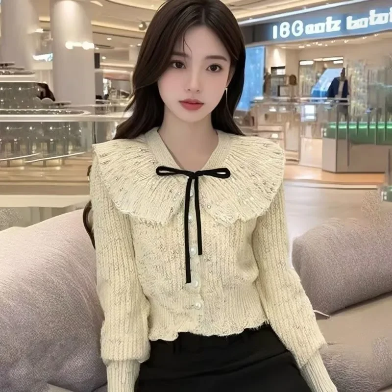 

New French Style Doll Collar Sweater Women's Pearl Breasted Butterfly Style Waist Short Knit Sweater