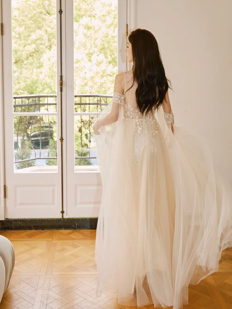 

A flowing tulle design with sequined little dress for coming-of-age gifts