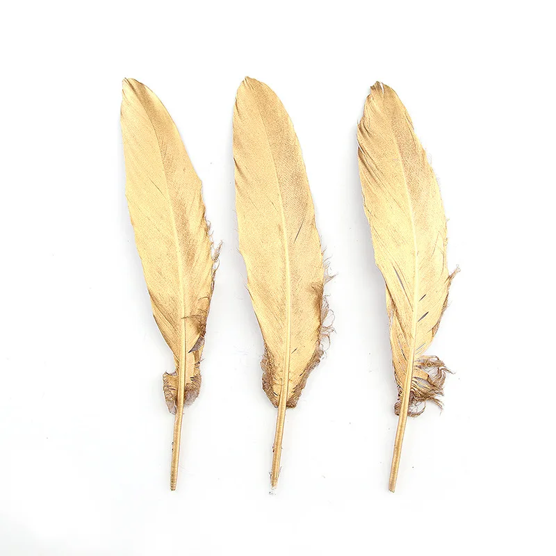 

Wholesale golden feather 15-20cm spray golden goose feather hard floating DIY goose feather craft decoration raw materials