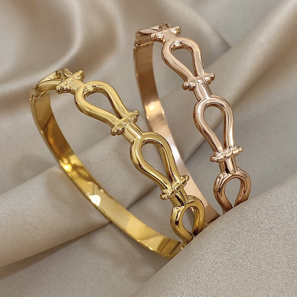 

Classic Irregular Stainless Steel Spring Bangle Bracelet for Women Minimally Hollow Out Wide Cuff Bracelet Waterproof Jewelry