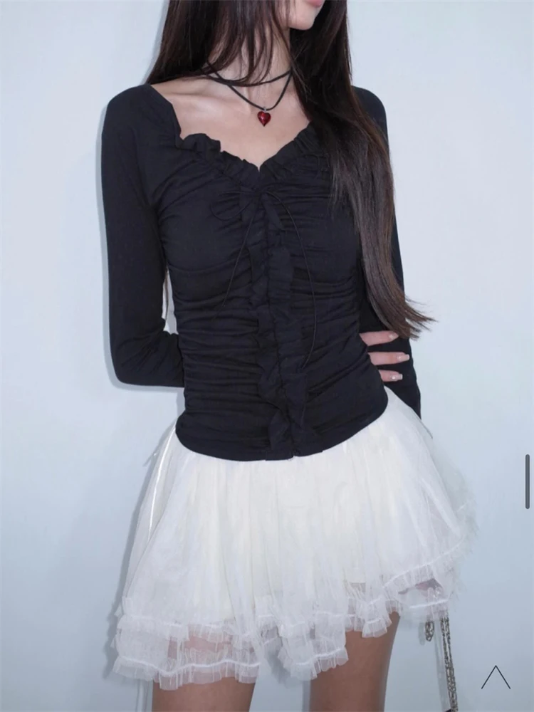 เสื้อยืดสตรีทรงสลิมฟิต แขนยาว ดีไซน์ผูกปมไม้ ผ้าผสมคอตตอนและโพลีเอสเตอร์