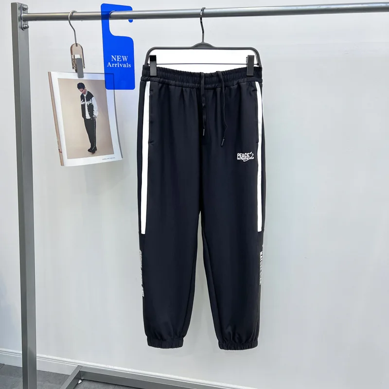 

Летние мужские модные трикотажные спортивные брюки с вышивкой и манжетами, свободного кроя, повседневные, молодежные, трендовые, брендовые