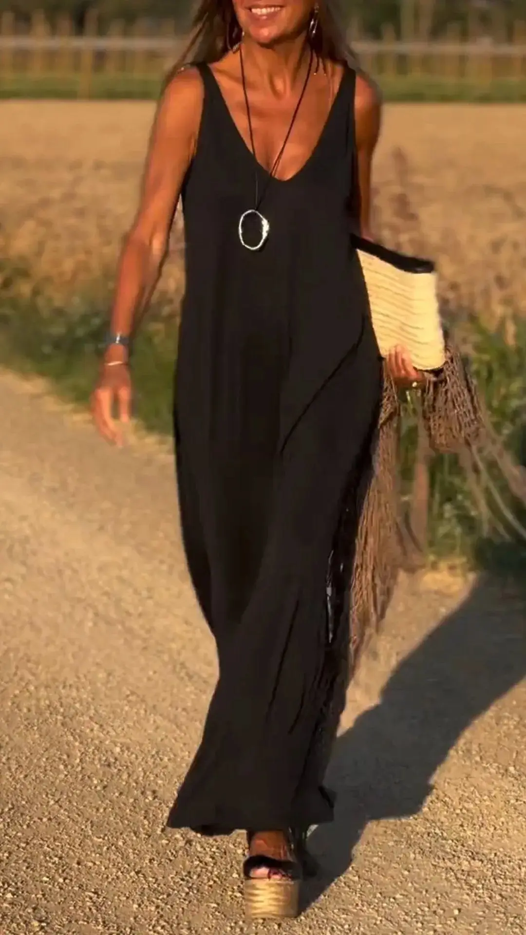 2025 Primavera E L'estate Nuove Vacanza Casual Abito da Donna Alla Moda di Colore Solido Senza Maniche Sexy Alla Moda con Scollo a V Gonna Lunga Allentata