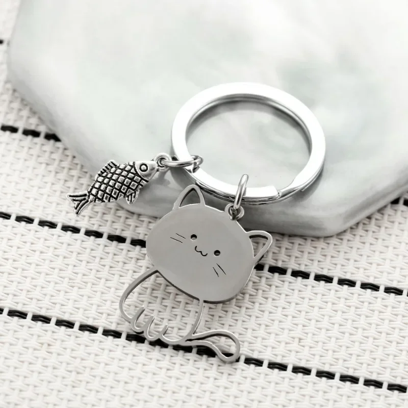 Neue japanische Katze isst Fisch Schlüssel ring Edelstahl Schlüssel anhänger niedlichen Cartoon Katze Anhänger Paar Schlüssel anhänger Taschen Autozubehör