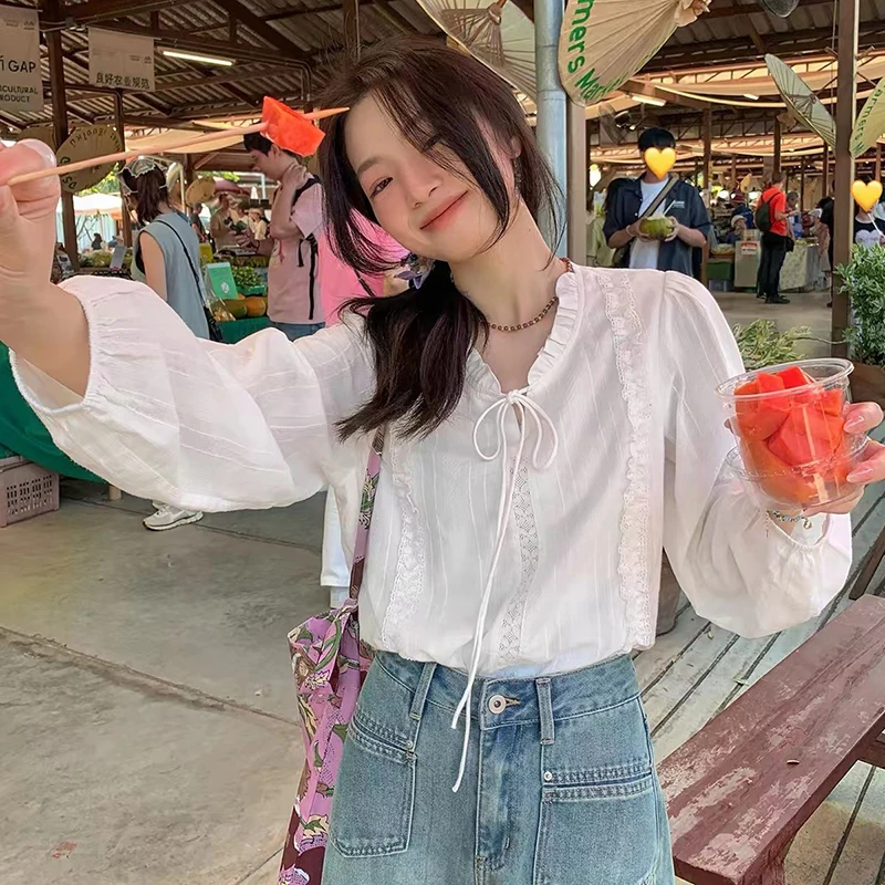 Korean White Lace-Up Lace Ruffles Shirts Women 2026 Vacation Style Loose Long Sleeve Shirt Ladies Patchwork Soft Chic Blouse