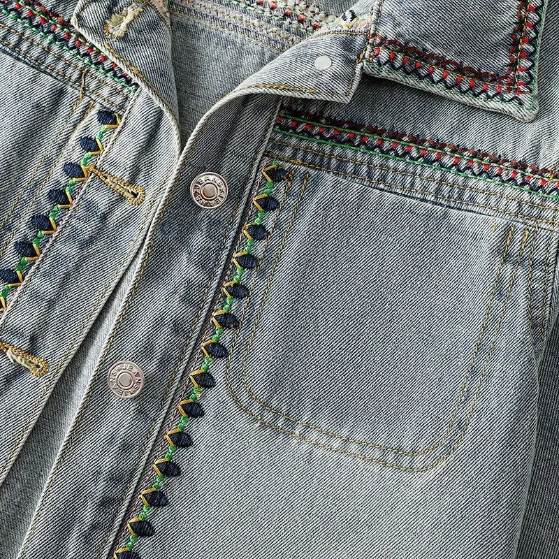 แจ็คเก็ตยีนส์ทรงหลวมสไตล์สตรีทแฟชั่นใหม่ประจำฤดูใบไม้ร่วงปี 2025 ของ Heavy Industry Joker  พร้อมลายปัก