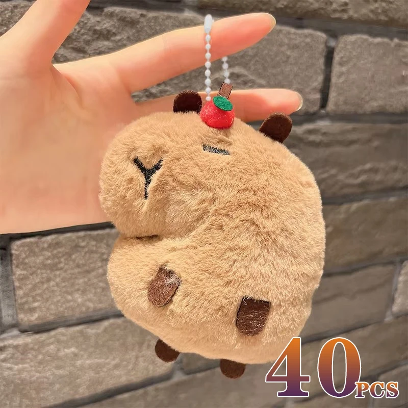 1-40 Uds. Llavero de peluche de conejillo de indias de Navidad Kapi Bara Squeak muñeca colgante bolsa encanto regalo de cumpleaños de Navidad decoración del hogar