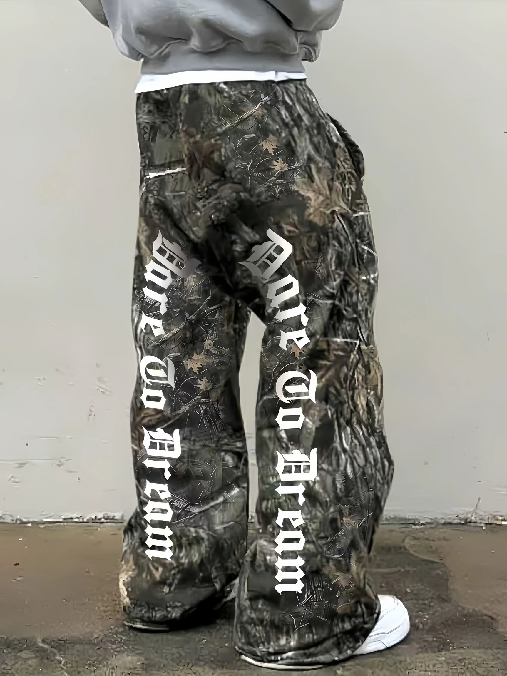 

Leafy Camouflage Patchwork Pants with Vintage American Pocket Design | Fashion Y2K Streetwear Jungle Print Trousers for Men | Mu