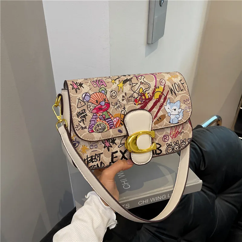 

2025 Doodle Mini Shoulder Bag - Cute Cartoon Print Crossbody for Women. Lightweight, Adjustable, Trendy & Unique.