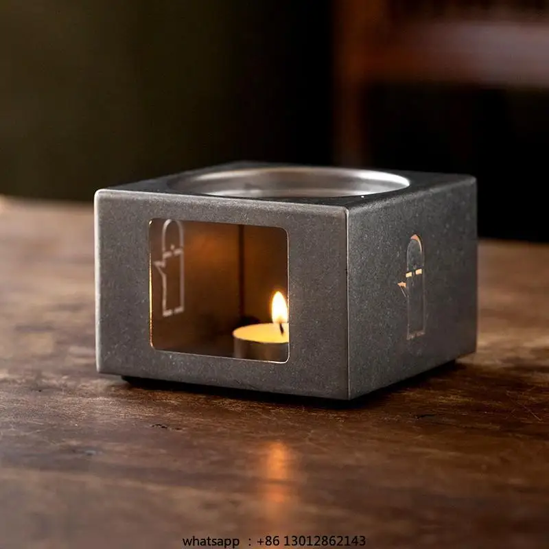 

Cute little stove candle warm teapot atmosphere base