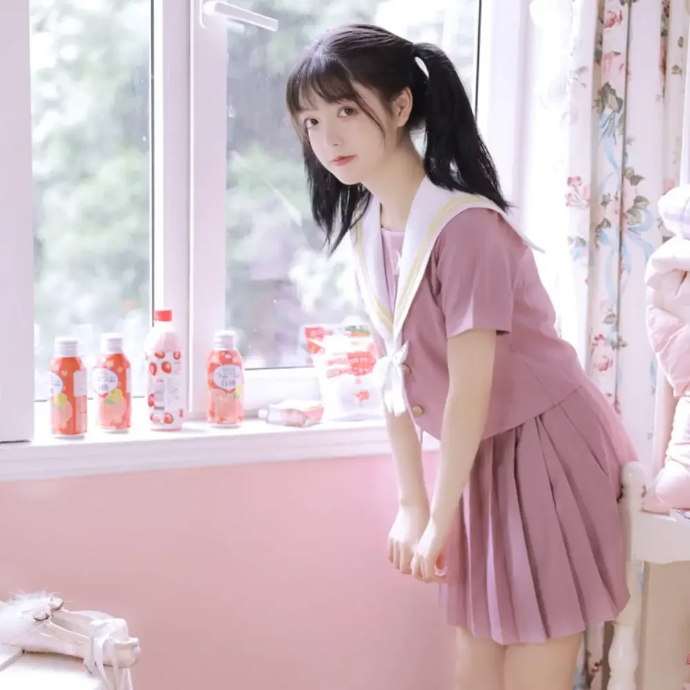 Set uniforme per ragazza scolastica coreana e giapponese Set di orchidee di giada rosa Abito Jk di base Gonna a pieghe Sailor Club Anime COS Costumi da donna